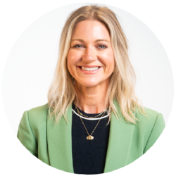 A person in business attire smiling. The image represents an employee with Insight Global’s Evergreen Division.