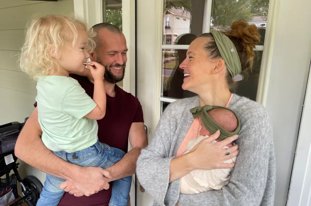 Novant Health patient Courtney Mosser joyfully smiles with her family