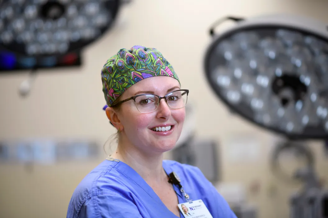 Novant Health neurosurgeon Dr. Wackerle smiles in an operating room