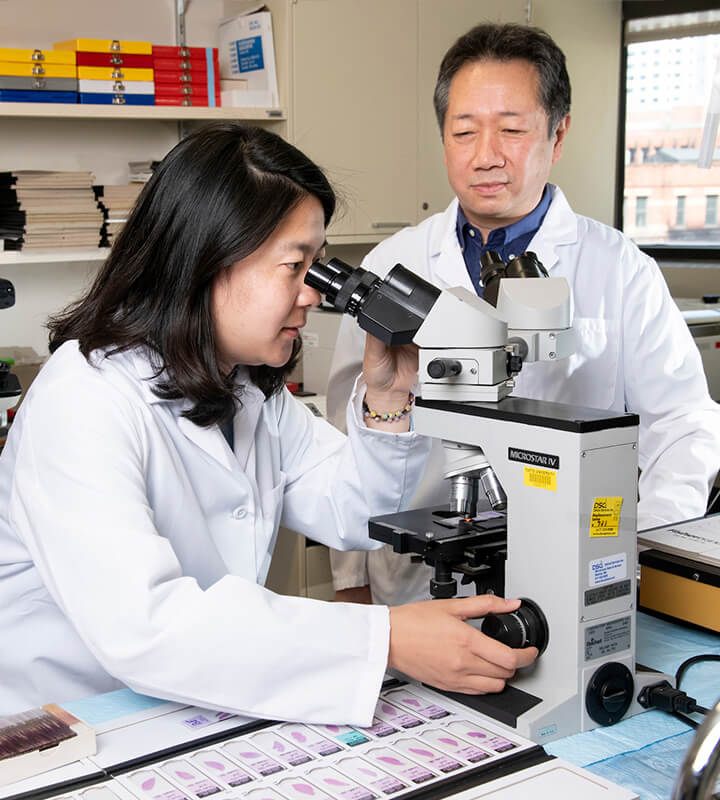 A doctoral student and her faculty mentor in a lab at the Human Nutrition Research Center on Aging on Tufts' Boston, Mass. Health Sciences campus.